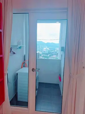 a bathroom with a shower with a view of a city at 1BR Condo Straits Garden Suites Georgetown Penang in George Town
