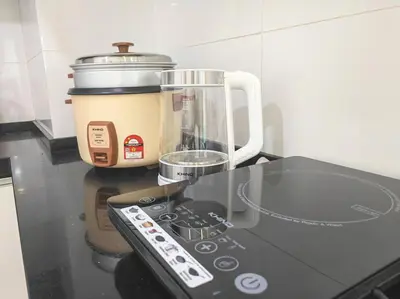 a counter with a food processor and a blender at 2bedroom 2bath 13th Seaview MansionOne Gurney in George Town
