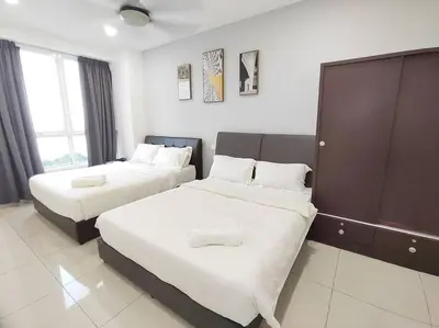 a hotel room with two beds and a large window at 2bedroom 2bath 13th Seaview MansionOne Gurney in George Town
