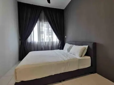 a bedroom with a large bed with a window at Arcadia Homes 3A The Quintet, Cameron Highlands in Tanah Rata