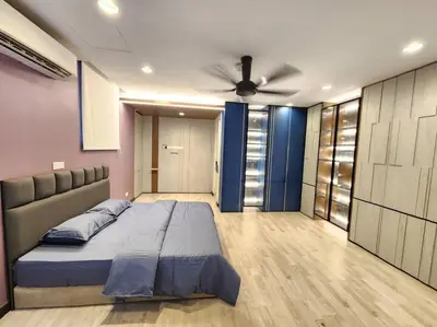 a bedroom with a bed and a ceiling fan at 5min to juru & bukit minyak industrial semi D in Bukit Mertajam