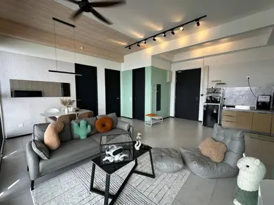 a living room with a couch and a table at PICO VR, 3BR 3 queen bed, 2 car park, UrbanSuites by XW Home in Jelutong