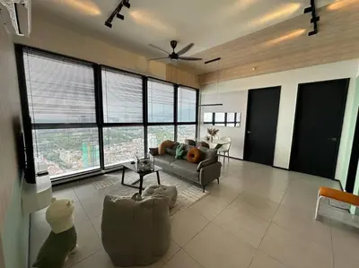 a living room with a couch and a table at PICO VR, 3BR 3 queen bed, 2 car park, UrbanSuites by XW Home in Jelutong