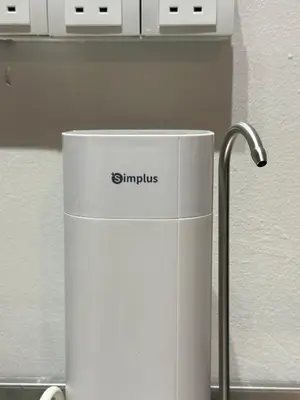 a white appliance sitting on top of a counter at Be Right Back Loft - Alma in Kampong Ayer Merah