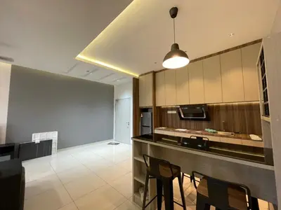 a kitchen with a table and chairs in a room at The Horizon Ipoh 3BR MAGNOLIA -by Goswell in Ipoh