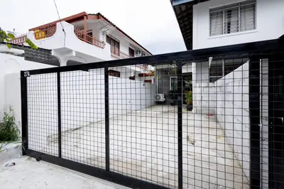 a gate in front of a house at Casa for 4 - Private Studio Ipoh in Ipoh