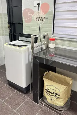 a trash can sitting next to a counter in a store at Little Homestay - \u5c0f\u5c0f\u6c11\u5bbf in Ipoh