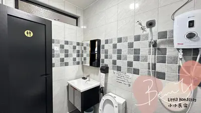 a bathroom with a toilet and a sink at Little Homestay - \u5c0f\u5c0f\u6c11\u5bbf in Ipoh