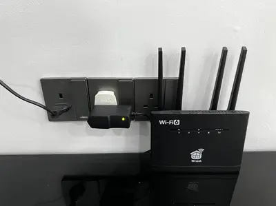a computer system with a mouse and a box at raub homesty in Kampong Sempalit Hilir