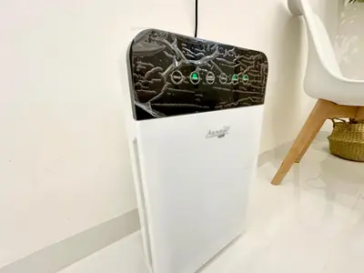 a white refrigerator with a display on a wall at Stylish Cozy Landed Jelutong 3BR 2B 4CP-10pax by 3C in Jelutong