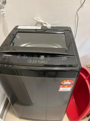 a printer sitting on top of a table at Ipoh Town Majestic Suites by IWH Suites in Ipoh