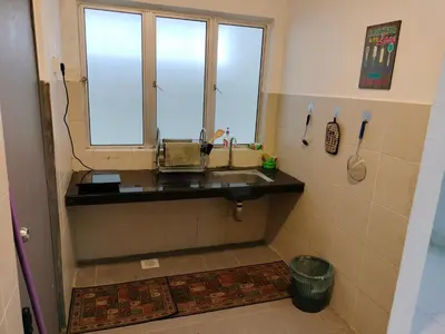 a bathroom with a sink and a window at Ammara Homestay 2 Emerald Avenue Brinchang in Brinchang