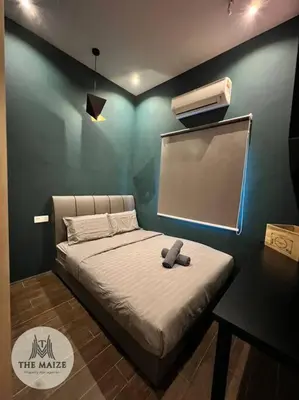 a room with a bed with a chalkboard on the wall at The Urban Lodge - Tasek Avenue Ipoh in Ipoh