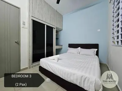 a bedroom with a large bed with a large window at Cozy Nest - Sky Garden Residence Ipoh in Chemor