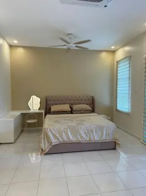 a bedroom with a bed and a ceiling fan at Super Minimalist SP Town Centre in Sungai Petani