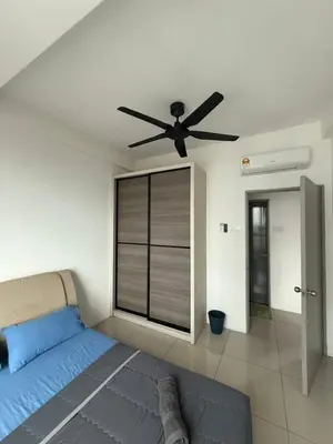 a bedroom with a bed and a ceiling fan at Casa Kayangan Meru Ipoh 3BR DAISY -by Goswell in Ipoh