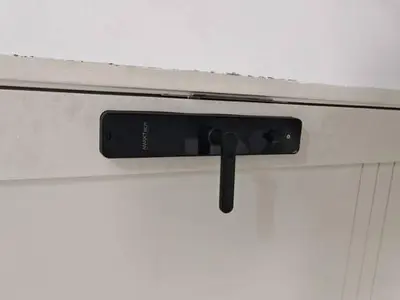 a cell phone is on top of a door at Comfortable Greenery in Seri Iskandar