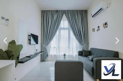 a living room with a blue couch and a window at anderson condo in Ipoh