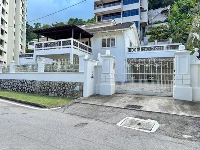 a white house with a fence and a gate at PRIME Location - 5 Mins Walk to Shops & Eateries! in Tanjung Bungah