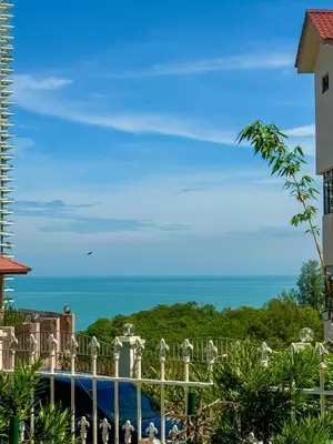 a view of the ocean from a building at PRIME Location - 5 Mins Walk to Shops & Eateries! in Tanjung Bungah