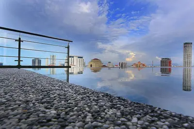 a body of water with a city in the background at Seaview Sunrise 1BR at Tropicana 218 at Central Location & Food Hunt Friendly in George Town