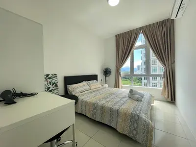 a bedroom with a bed and a window at Ipoh Town Centre The Anderson For 5pax in Ipoh