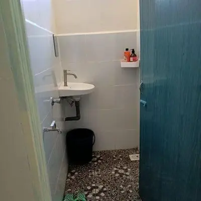 a small bathroom with a sink and a toilet at MKF Homestay Padang Stang, Gerik in Gerik