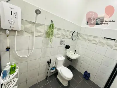 a bathroom with a shower and a toilet and a sink at Little Homestay Two - \u5c0f\u5c0f\u6c11\u5bbf2 in Ipoh