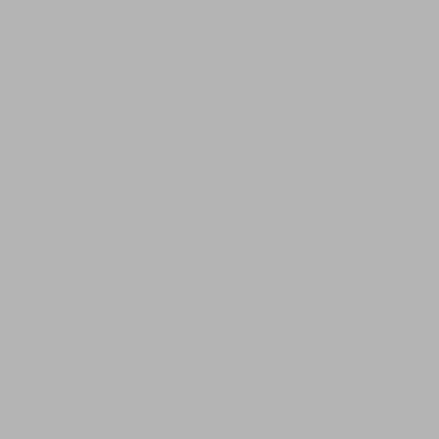 a bedroom with a bed and a desk and a bed sidx sidx sidx at SP Golden Star Hotel in Kampong Tongka