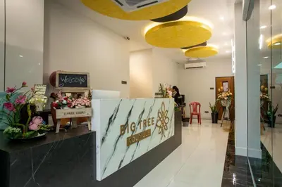 a flower shop with a sign in the middle of a lobby at Big Tree Boutique in Ipoh