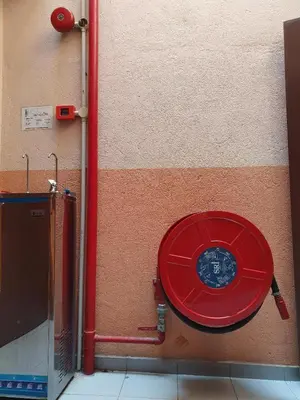 a red toilet on the side of a wall at Hotel Jelai Kuala Lipis (Jln Bk Bius) in Kuala Lipis