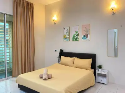 a bedroom with a bed with a stuffed animal on it at CozyHouse 4ROOM 3BATH ROOM 10PAX```SimpangAmpatTasek in Simpang Ampat