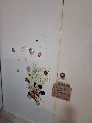 a white refrigerator with stickers on the side of it at Anderson Zara Homestay in Ipoh