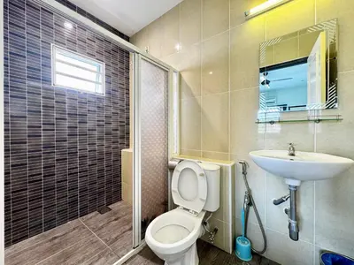 a bathroom with a toilet and a sink at i Homes Villa 2 at Ipoh Town 16 Guest in Ipoh
