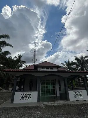 a house with a green door on top of it at Bagan Serai Simpang Empat Parit Buntar Perak by 3SIBS in Bagan Serai