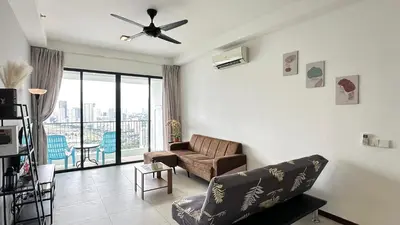 a living room with a couch and a ceiling fan at LM HomeyC 3BR Family Suite for 4-14 Pax with Nexflix & Coway Water Purifier in Tanjong Tokong