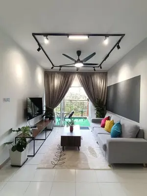 a living room with a couch and a ceiling fan at Dream 6 Emerald avenue in Cameron Highlands