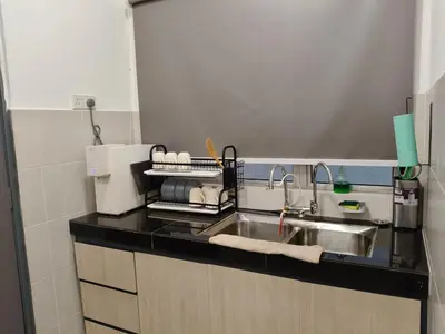a kitchen with a sink and a counter top at Dream 6 Emerald avenue in Cameron Highlands