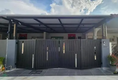 a metal garage with awning on top of it at Live Like Your Home, Alma Bukit Mertajam in Bukit Mertajam