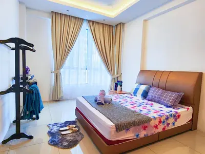 a bedroom with a bed in a room with a window at Ipoh Meru Casa Kayangan 6 Pax Fully Air-Con Homestay in Ipoh