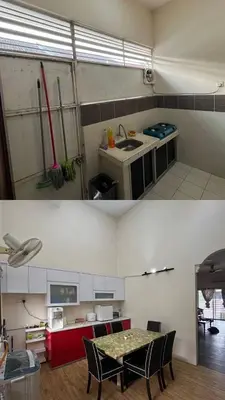 a kitchen with a table and chairs in a room at Azriff homestay in Seri Iskandar