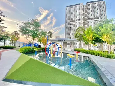 a pool with a water park in front of a building at Urban Suites #Walnut 1BR 1Bath suite #Infinity Pool #3pax #1Queen 1Single #Quality well maintained #Private host in Jelutong