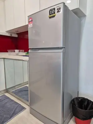 a stainless steel refrigerator in a kitchen at Modern & Relax Studio Penang in George Town