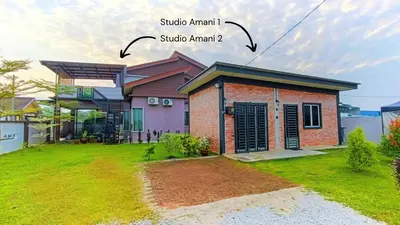 a house with the words studio amani and the words studio annex istg at Studio Amani 2 Permatang Pauh in Permatang Pauh
