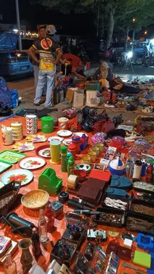 a table filled with lots of different types of items at Kak Chik Homestay Tasek Gelugor in Kampong Ayer Melintas Besar