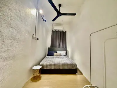 a small bedroom with a bed in a room at Home41#6pax#netflix#NearIconCity&AeonAlma in Bukit Mertajam