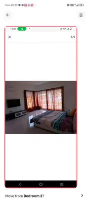 a screenshot of a room with a bed and a tv at Lumut Marina in Lumut
