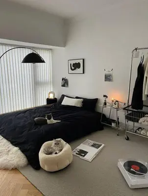 a bedroom with a large bed with aokedokedokedokedokedoked at Zaniera's Homestay in Tanah Rata