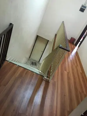 an overhead view of an empty room with wooden floors at 3999 Sejahtera Homestay in Lunas