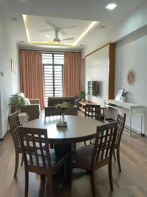 a living room with a table and chairs and a piano at GreenValley in Brinchang